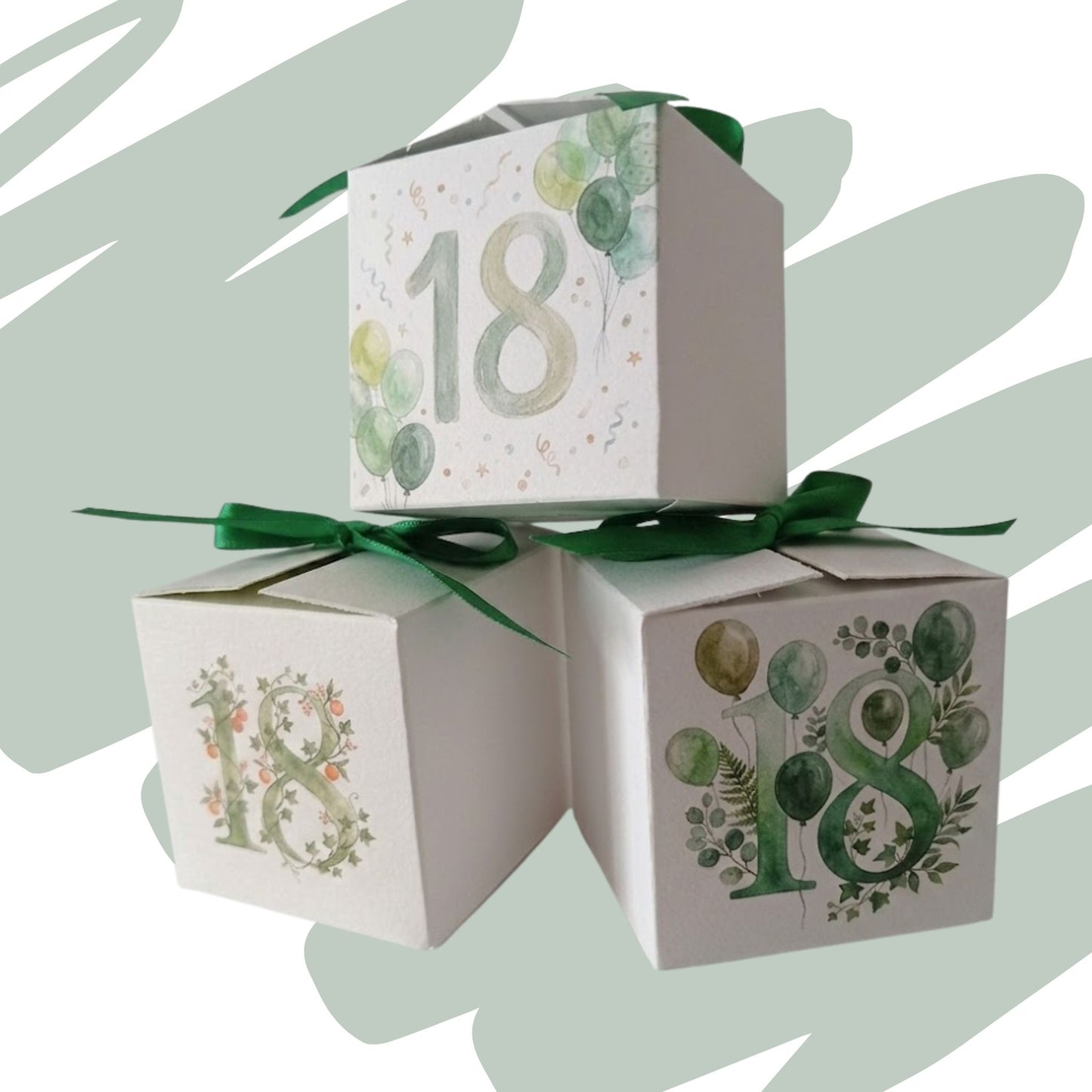 set di 3 scatoline portacinfetti in cartoncino bianco con stampa personalizzata per 18 anni ideale. numero 18 con decori di fiori e palloncini sul fronte e nome data sul retro, chiusa in alto con unanastro di raso di colore verde.