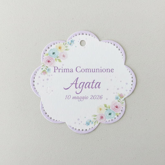 bigliettino bomboniera a forma di fiore con bordino lilla e piccoli fiorellini pastello, personalizzato con nome data ed evento. ideali per prima comunione, battesimo e santa cresima.